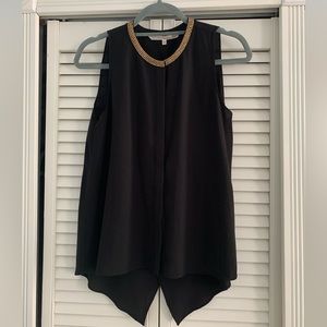 Rachel Roy, Black Sleeveless Top, Gold Studs Around Neck.